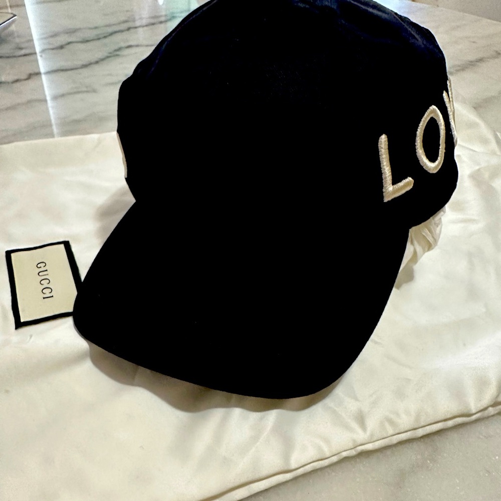 Authentic Gucci unisex Hat with “GUCCI LOVED” PRINTS ON THE SIDES